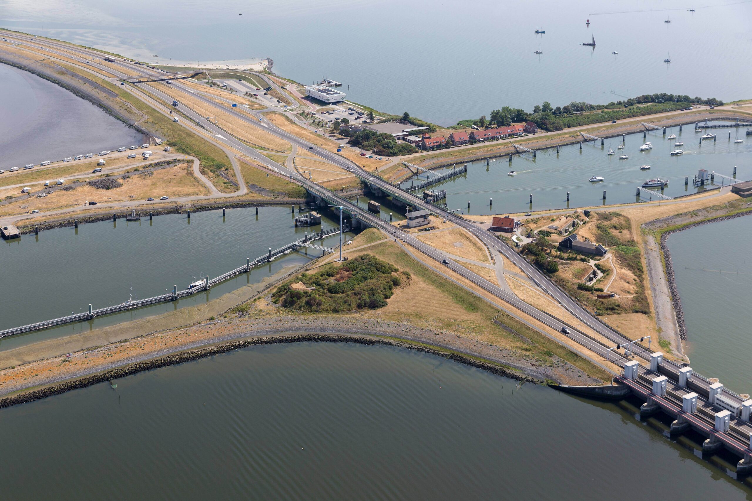 Aerial view Dutch sluices Kornwerderzand between IJsselmeer and Wadden Sea